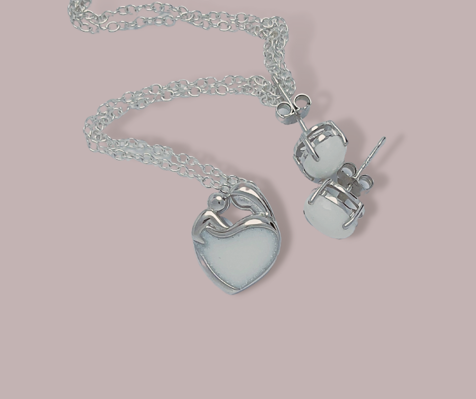 The Breastmilk necklace and Oval stud earrings