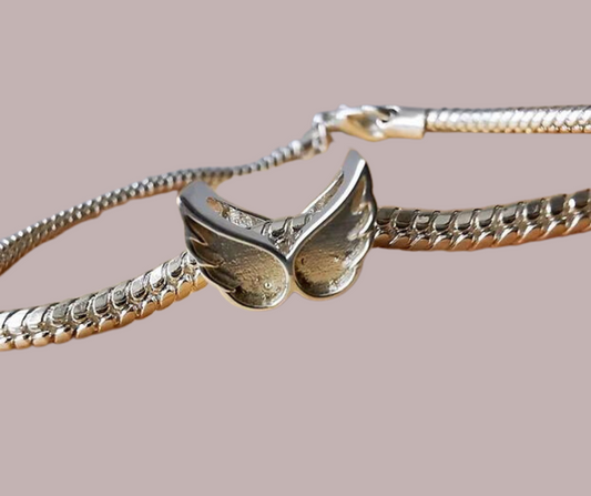 Angel wing charm